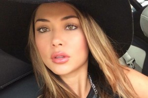20 امرأة «الأكثر إثارة» في العالم عام 2015: هيفاء وهبي ضمن القائمة Travis-Barker-dating-model-Arianny-Celeste