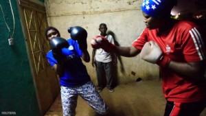 Sahar Mohamed Al Dooma (R), 26, challenges Saraa Mutawkil, 18, during boxing practice at Al Rabie club in Omdurman May 10, 2016. REUTERS/Mohamed Nureldin Abdallah