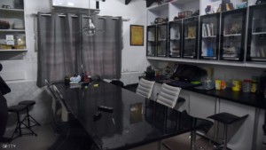 بالصور.. تاجر مخدرات يعيش في زنزانة "5 نجوم" View of Brazilian drug trafficker Jarvis Chimenes Pavao's cell at Tacumbu prison in Asuncion on July 28, 2016. Three rooms, a plasma TV, a library, and even a collection of DVDs of Colombian Pablo Escobar TV series, Jarvis Pavao Chimenes lived in a luxury cell in Tacumbu prison, one of the most crowded of Paraguay. / AFP / NORBERTO DUARTE / TO GO WITH AFP STORY (Photo credit should read NORBERTO DUARTE/AFP/Getty Images)